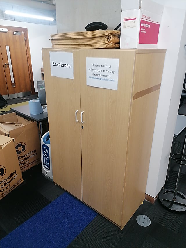 brown wooden 2-door cabinet