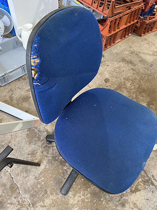 two blue and black rolling chairs