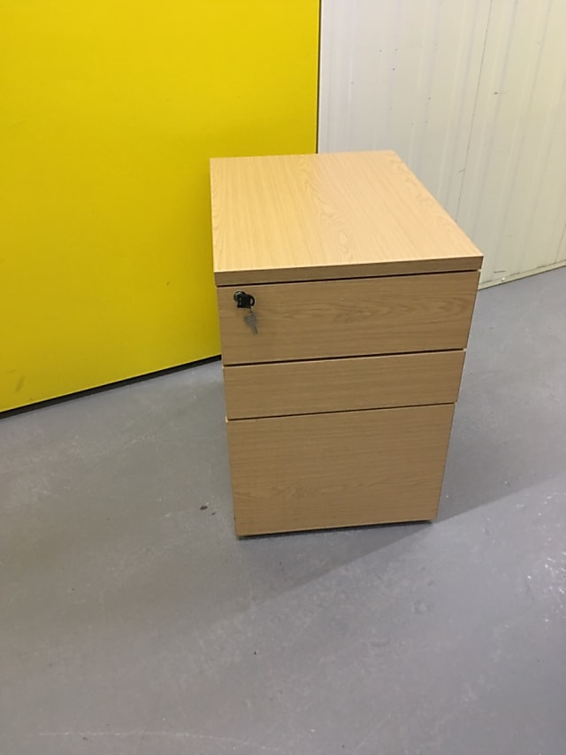 3 drawer wooden pedestal on wheels