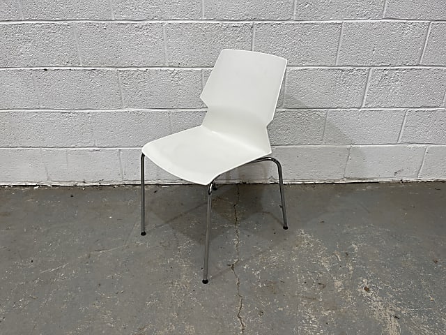 white plastic stacking chair