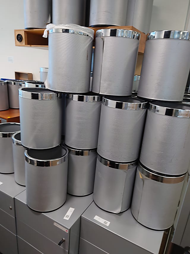 small silver circular bins