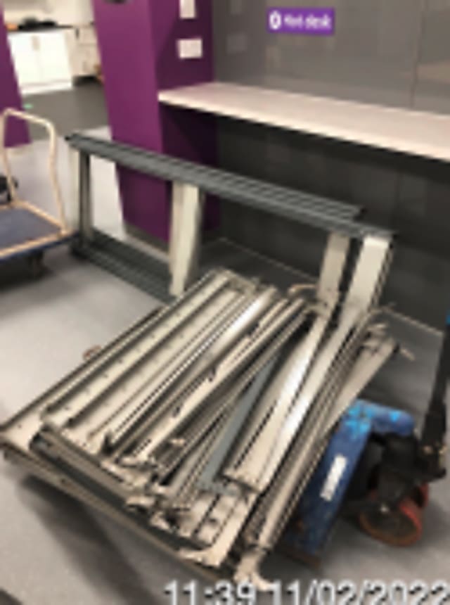 Dismantled metal shelves