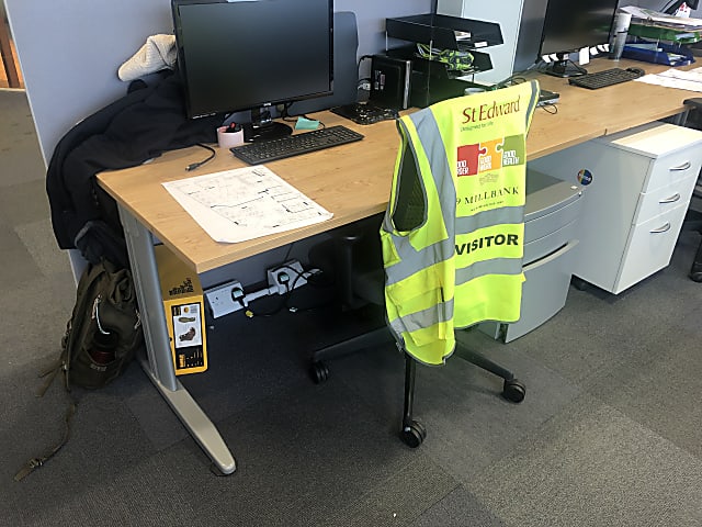 black and yellow computer desk