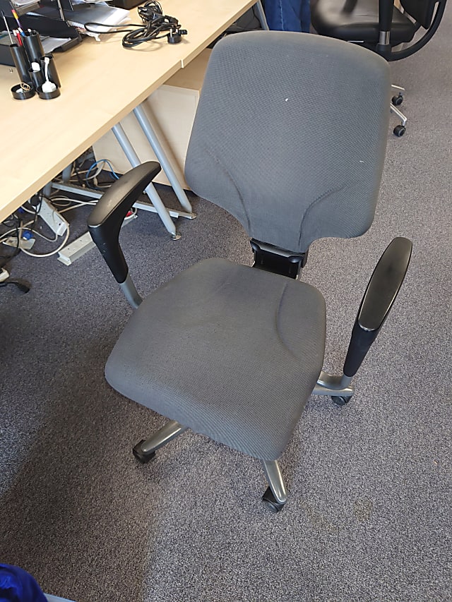 Grey operator chair 