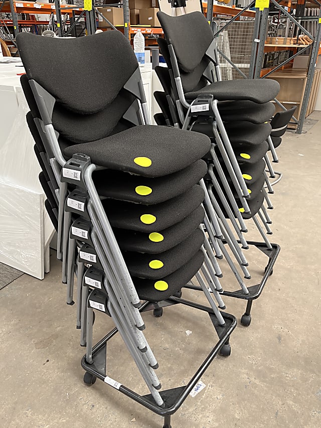 One Lot of 13 Stackable chairs on trolleys