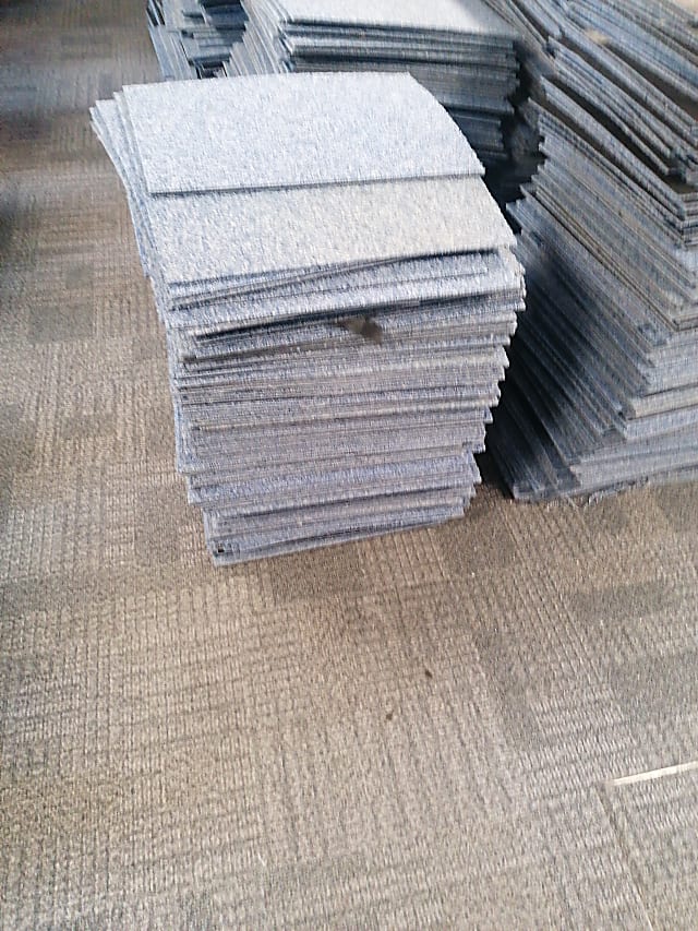 Pile of c50 carpet tiles