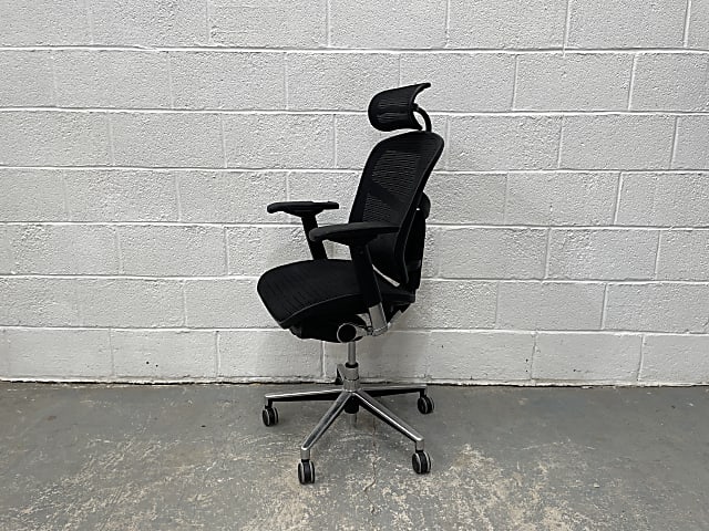 black and grey ergonomic mesh back chair with head rest