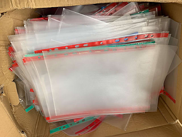 Big box of loose A4 punched pockets