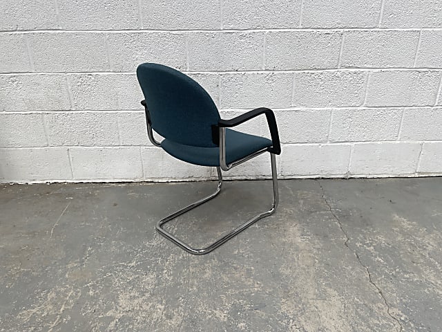 black and green metal armchair