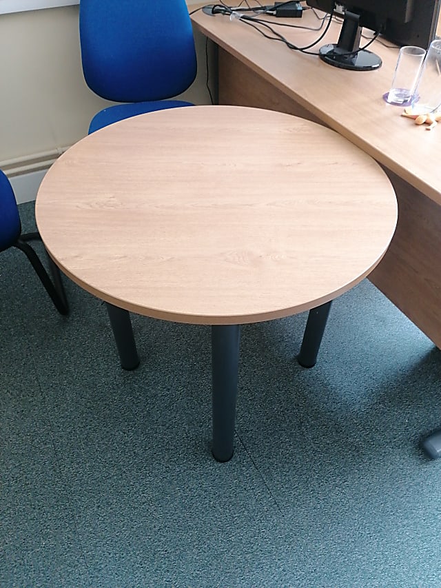 round brown wooden table with chair