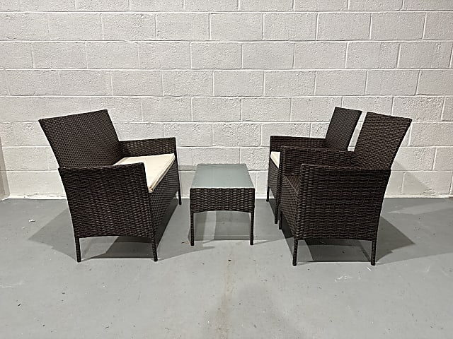 Rattan sofa set (1 missing cushion)