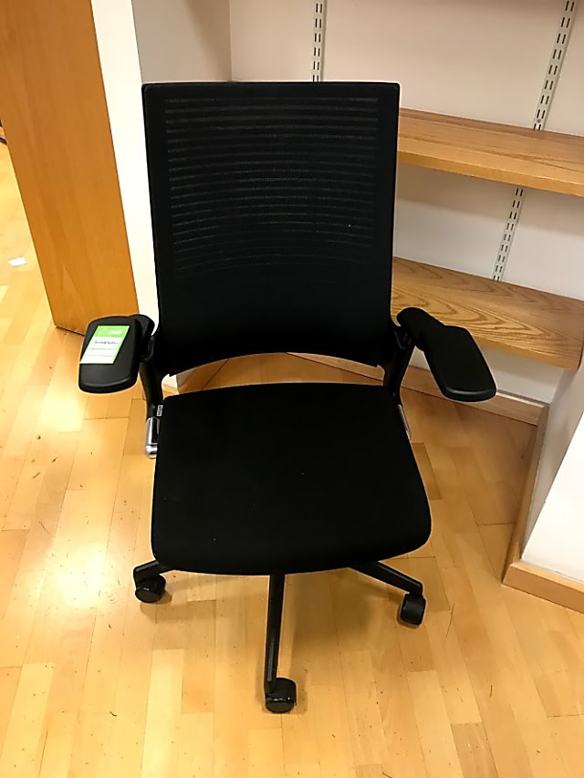 Black rolling office chair