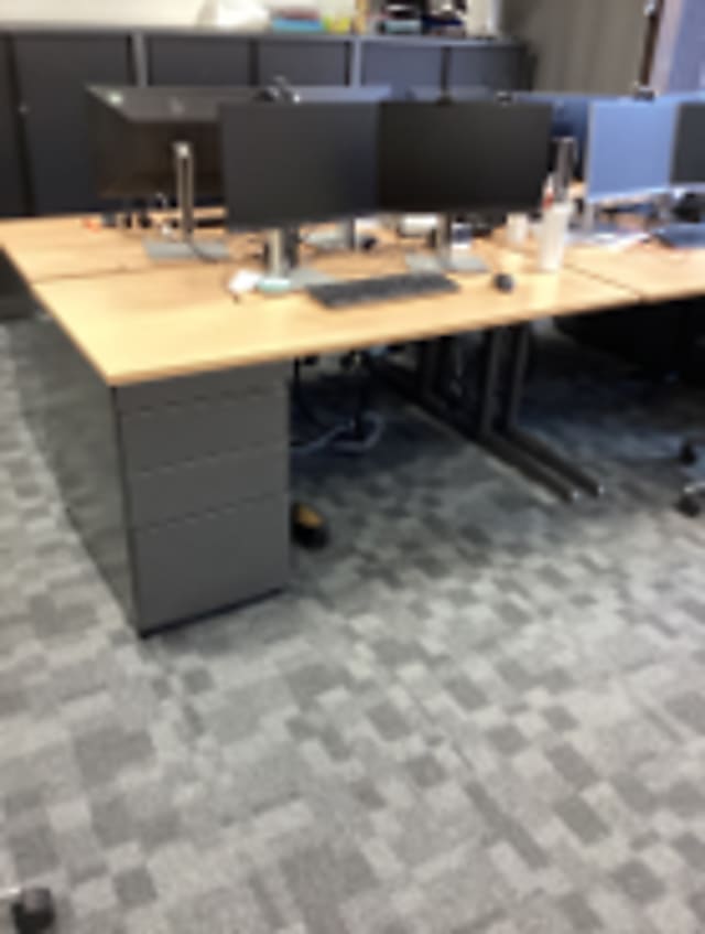 Brown grey wooden desk with  Integrated pedestal