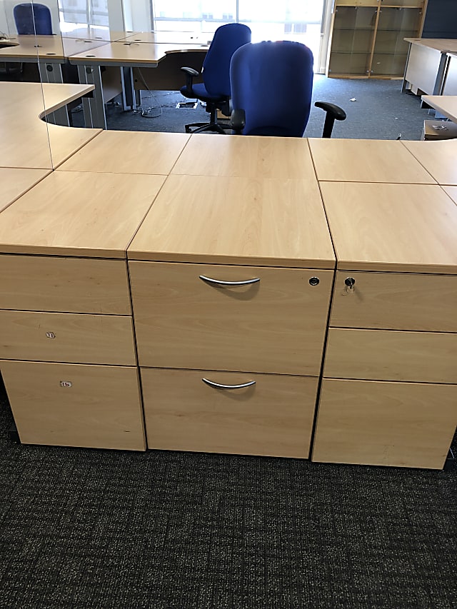 brown wooden 4-drawer chest pedestal