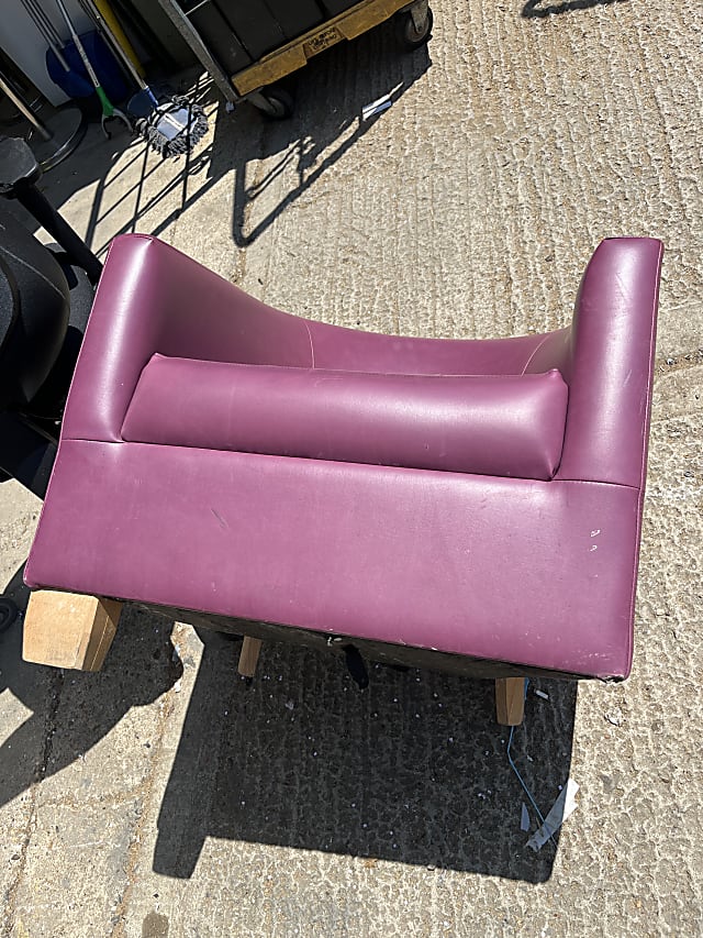 red leather padded rolling chair