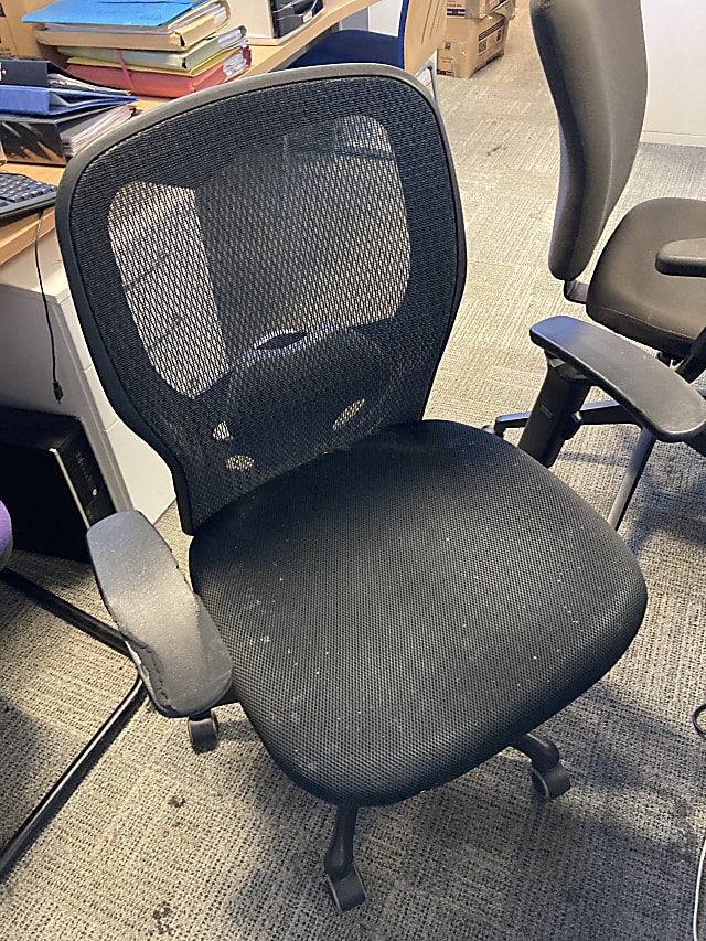 Black mesh backed office chair