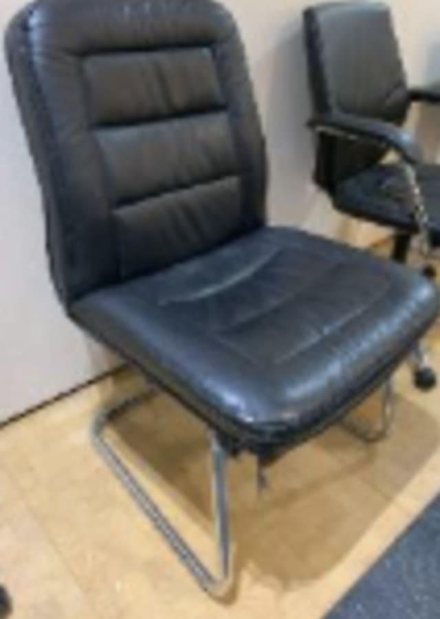 Tract Cantilever chair, thick padded black leather, chrome base