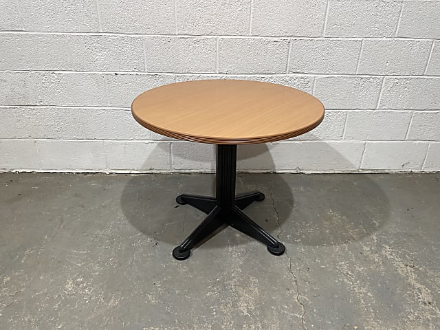 Round brown wooden table