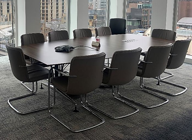 Meeting room table leather chairs