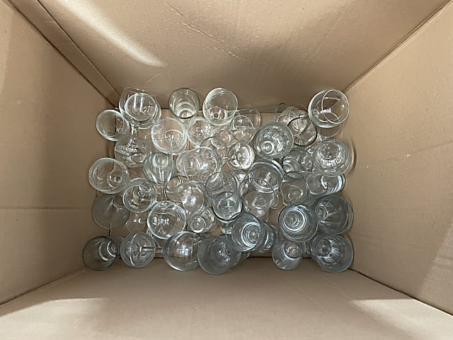 A box of Assorted Glasses kitchen glassware