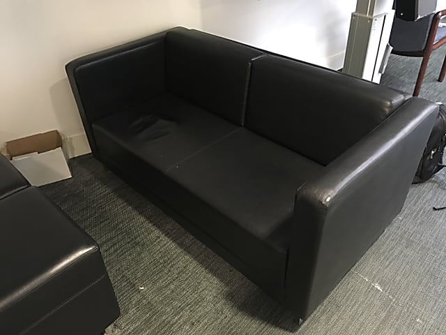 Black leather 2 seater sofa with 2 matching pouffes