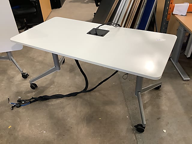 Folding desk with electrical sockets