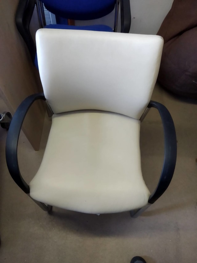 white and black padded fabric armchair