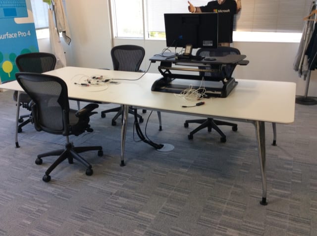 Large meeting table with power units