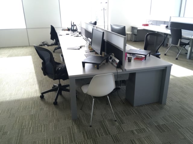 Bank of 6 light grey desks