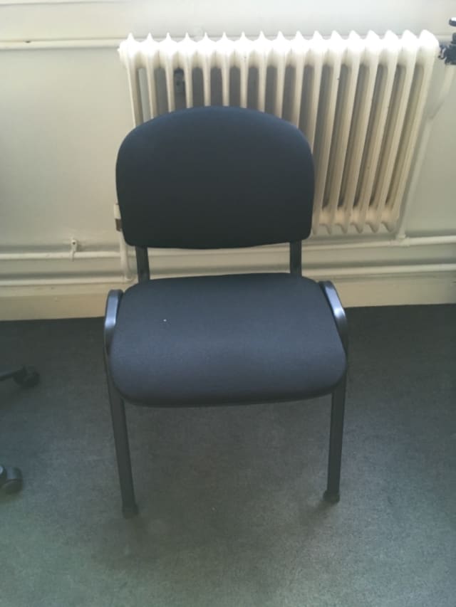 Black padded waiting room chair