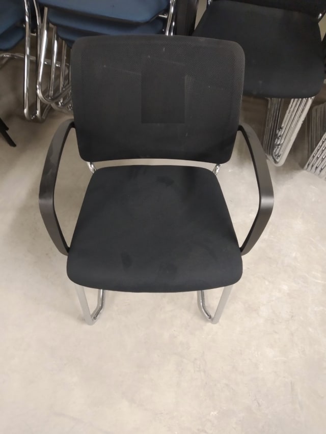 Black padded arm chair