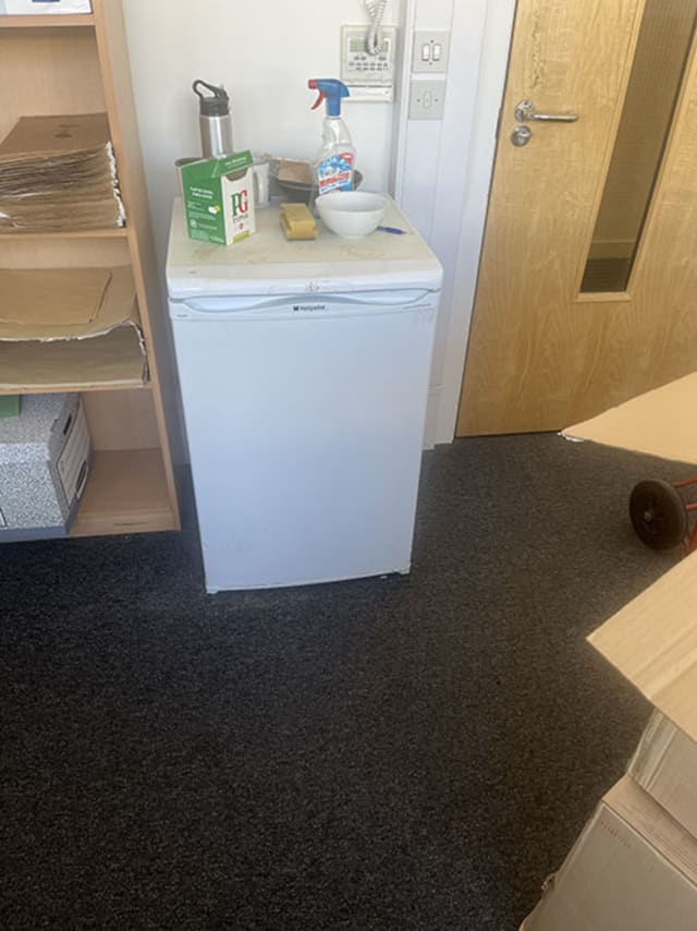 white single-door refrigerator