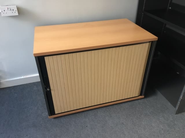 Small wooden tambour cabinet