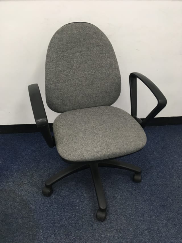 Light grey rolling operator armchair