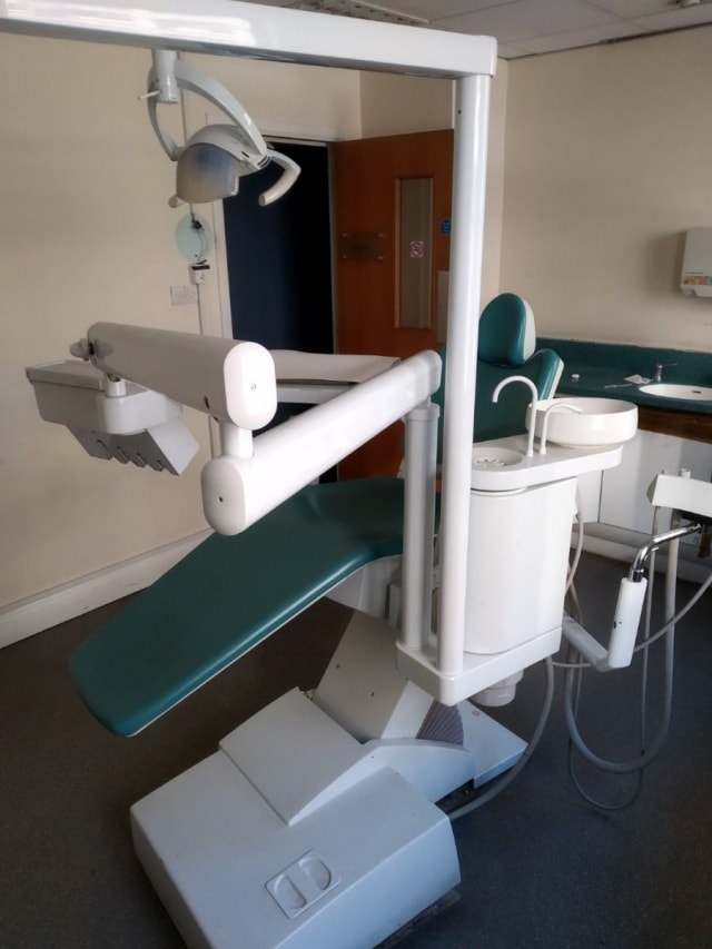 white and blue dental equipment