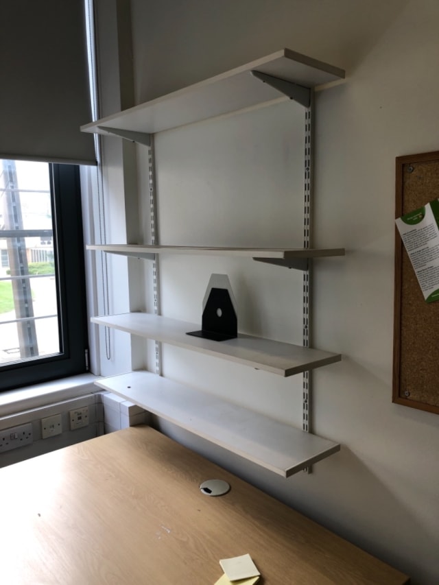 Wall shelves with brackets