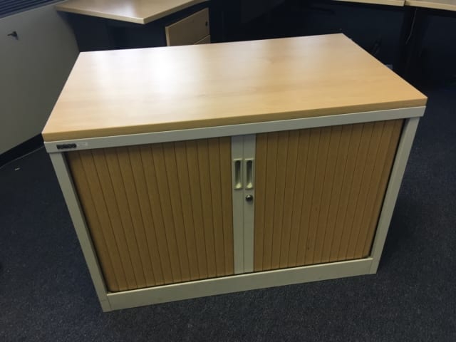 Low tambour cabinet with shelf