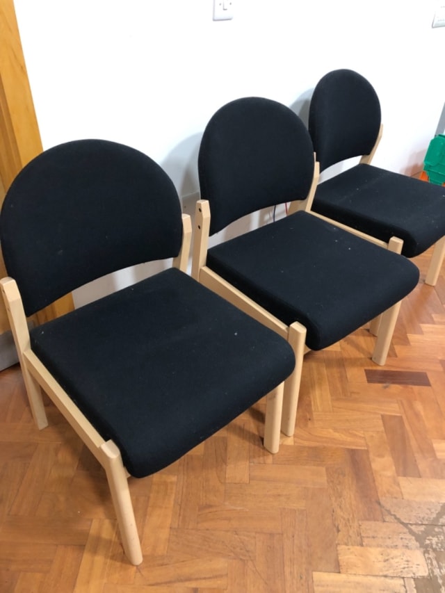 Black padded waiting room chairs