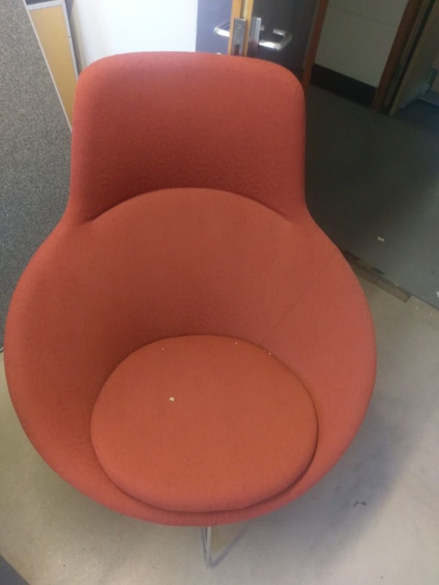 orange padded tub chair