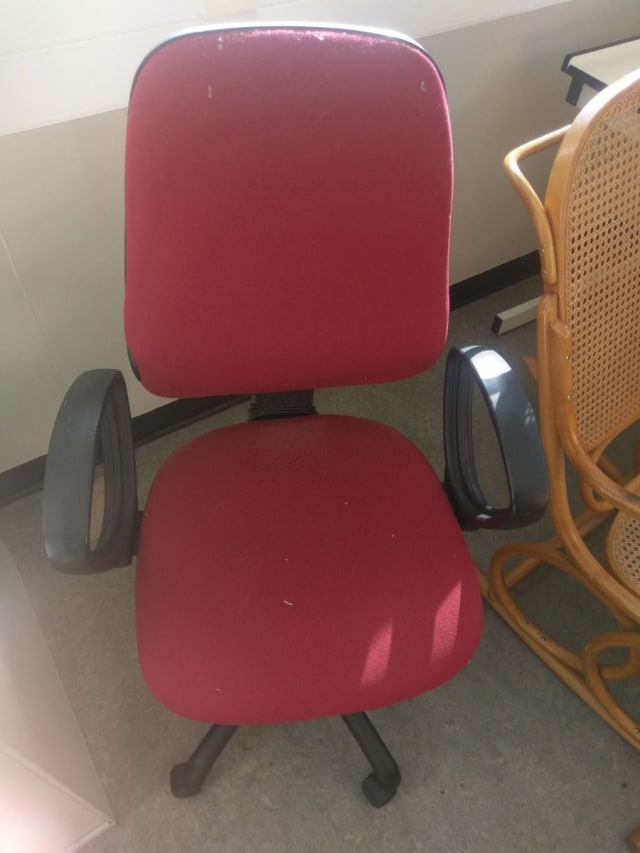 red and black swivel chair