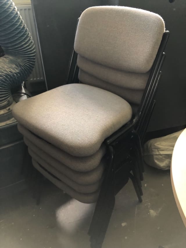 Grey padded waiting room chair