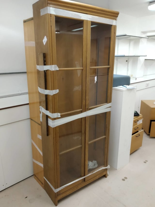 wooden display cabinet with glass panel doors