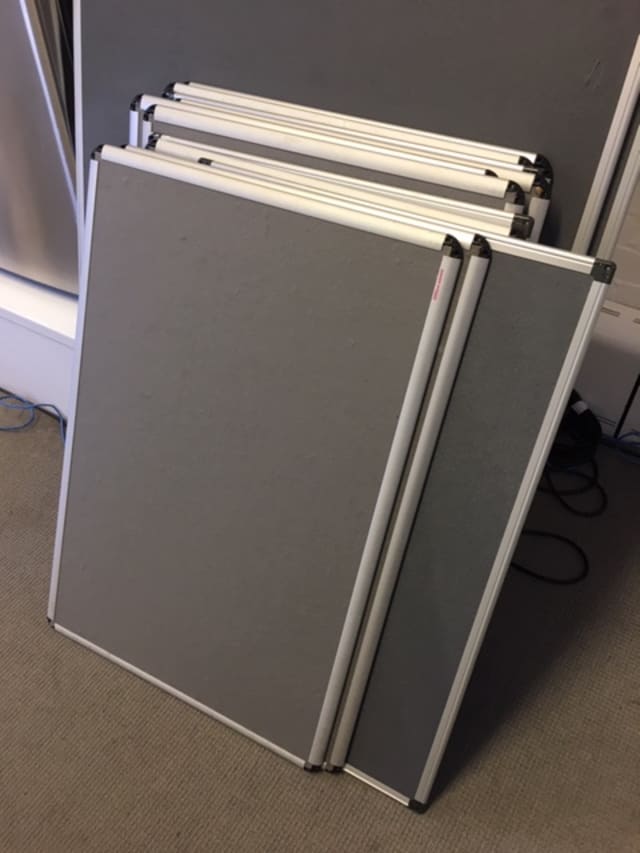 Large grey pin notice boards