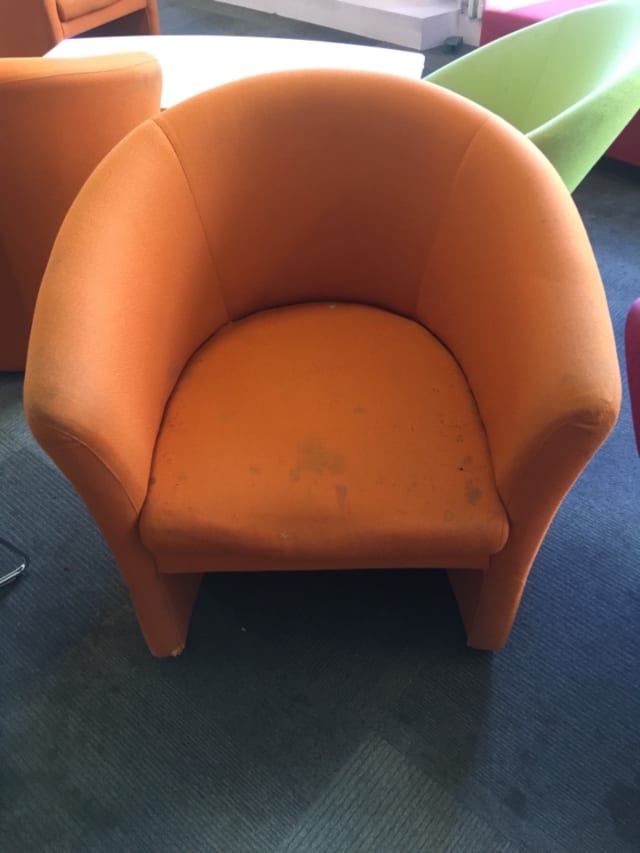 orange fabric armchair