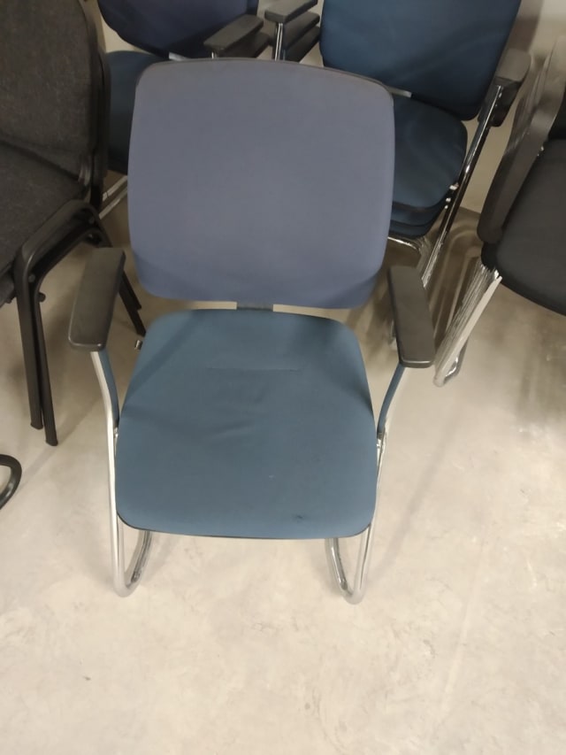 Blue padded arm chair