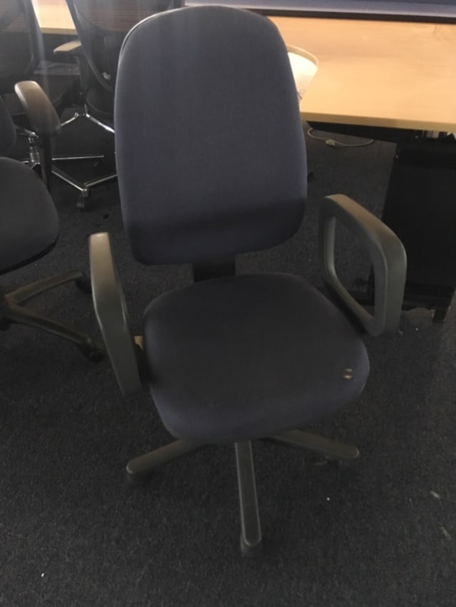 Dark blue operator chair on wheels