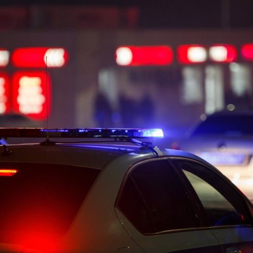 blue-police-car-light-night-city-with-selective-focus-bokeh-black-background (1).jpg