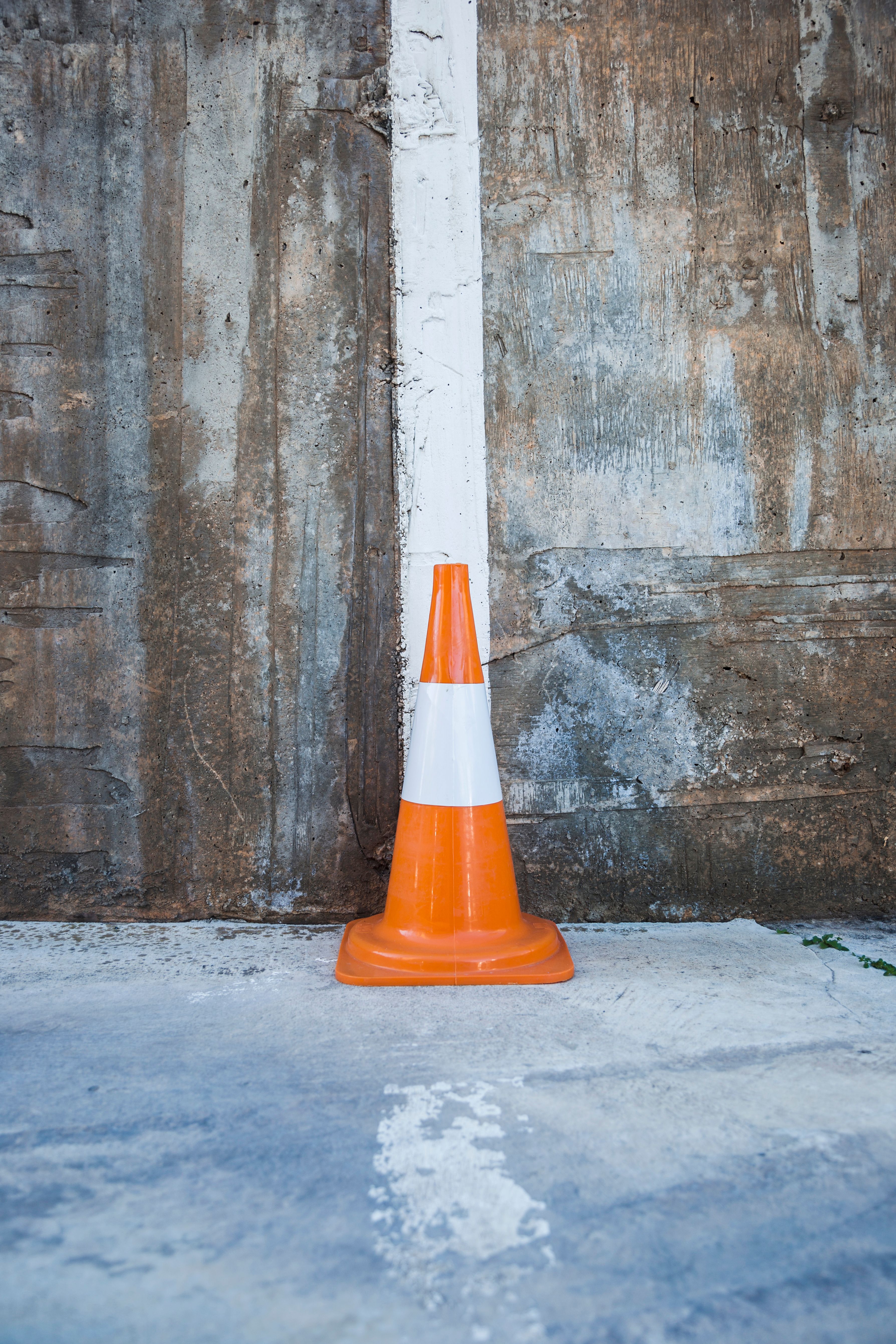 traffic-cone-against-wall.jpg