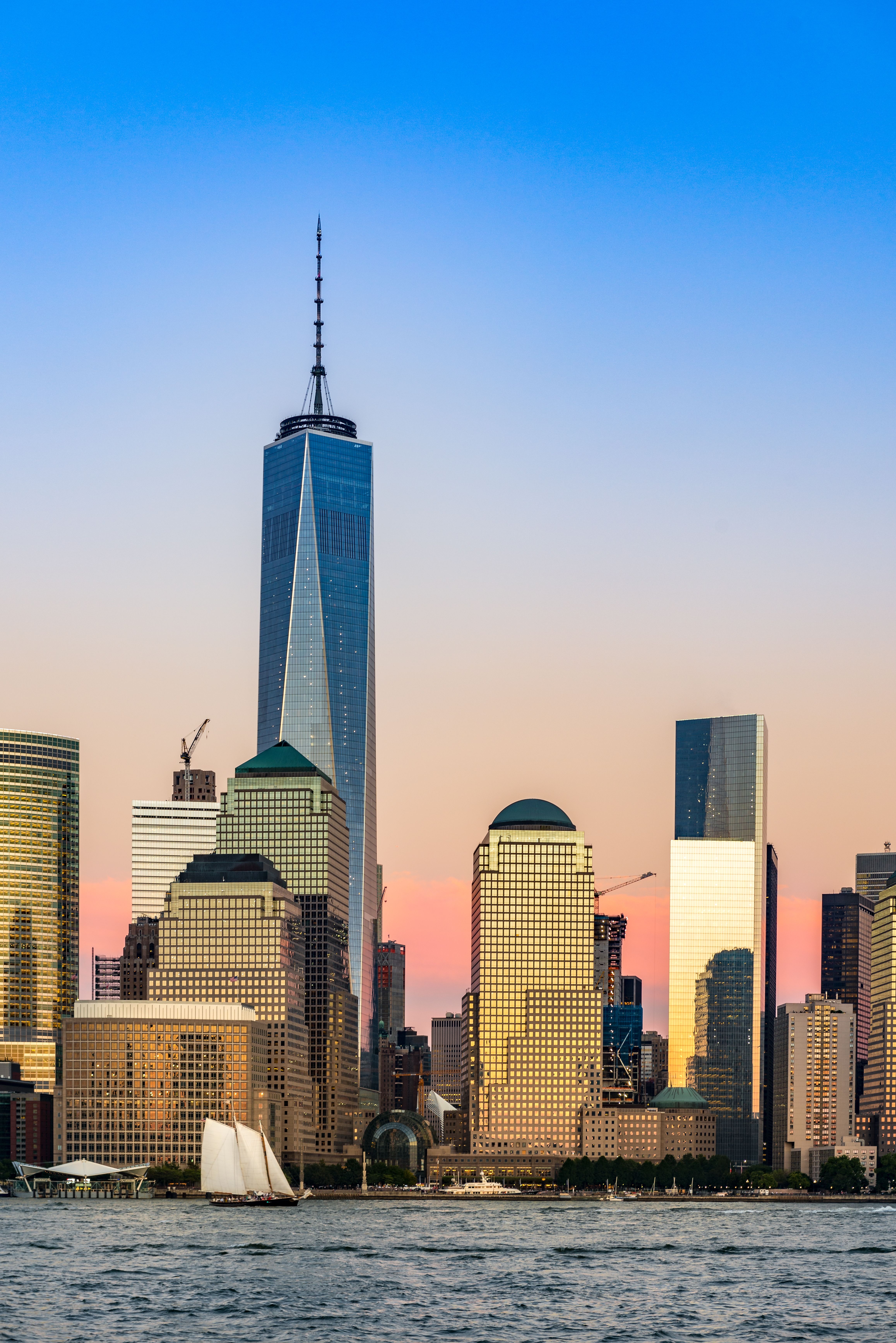 vertical-shot-syscrapers-sunset-manhattan.jpg