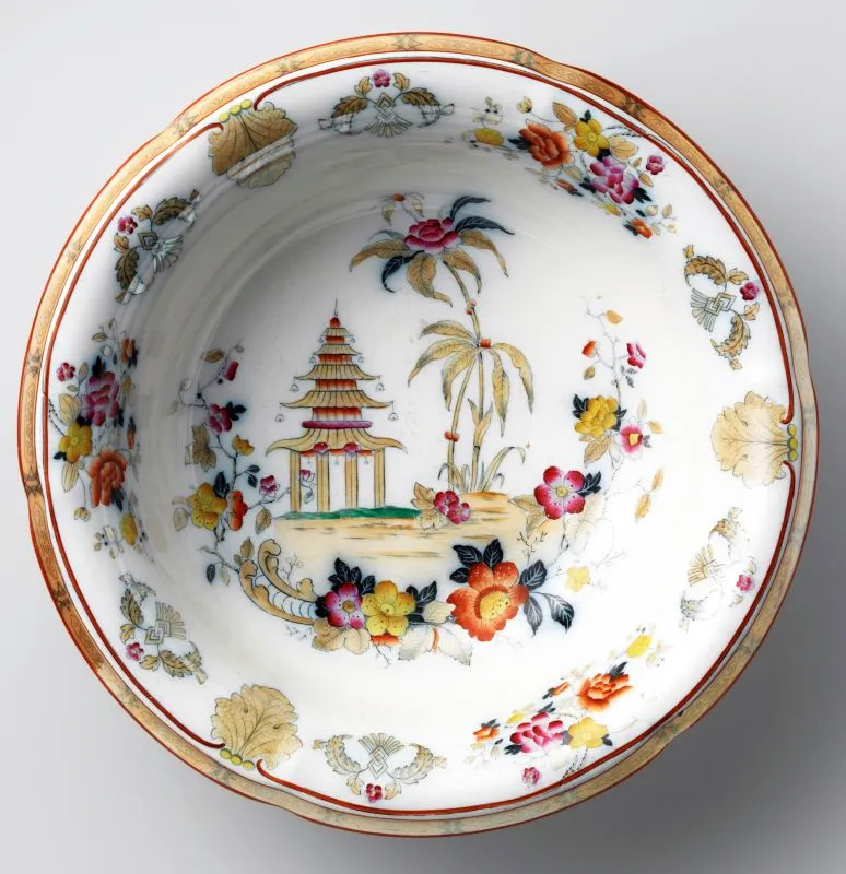 &nbsp; Washing bowl with floral motives and a pagoda, part of a washstand set, produced in 1882 by Petrus Regout and Co in Maastricht, Netherlands. Collection: ref. nr. BK-1983–229-B. Image by Rijksmuseum available under a&nbsp;Creative Commons License&nbsp;➚. Has only one or two clues that the inspiration is Chinese in origin.&nbsp;&nbsp;